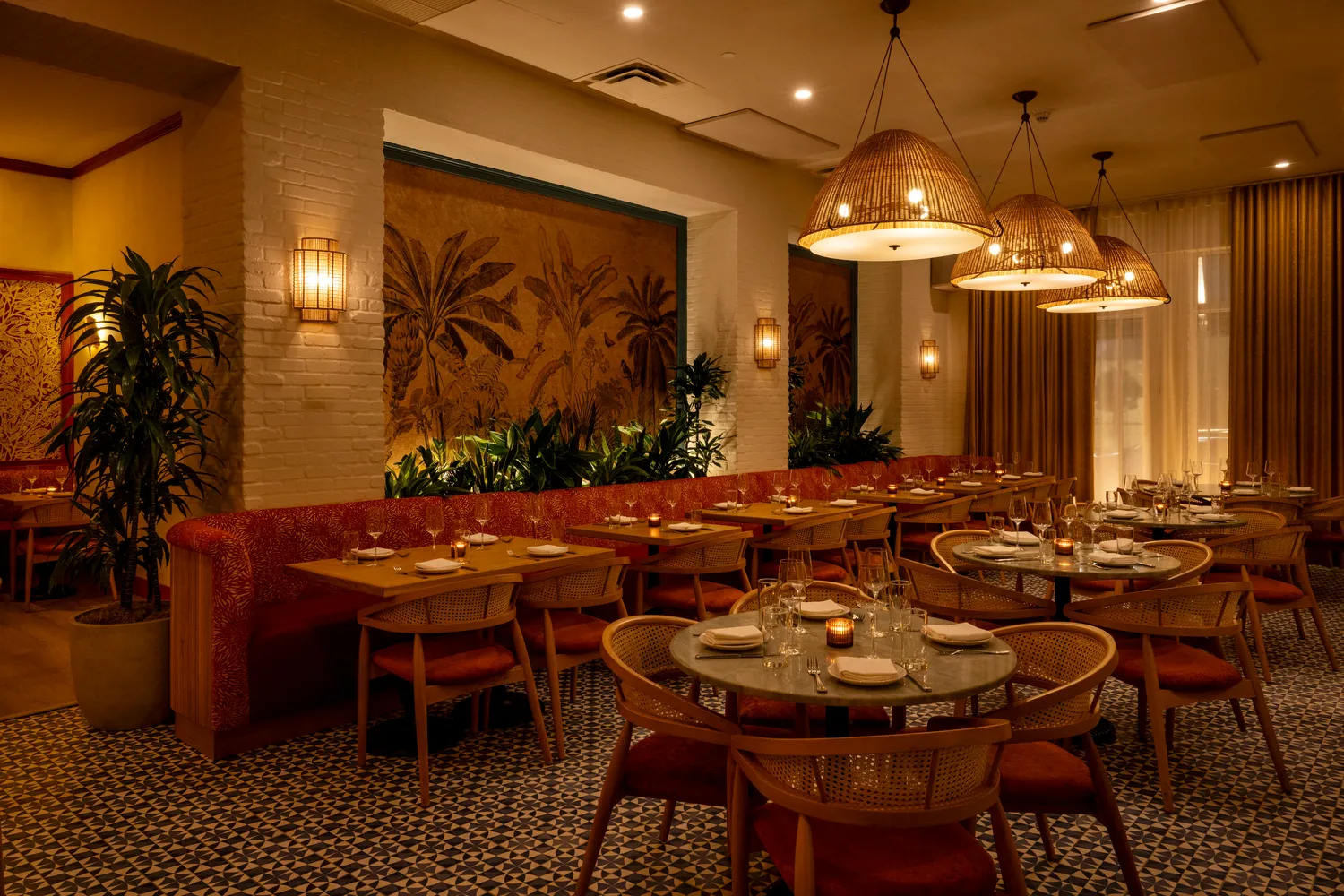 U-shaped teal wood bar with sage marble top at Paya restaurant, Miami Beach