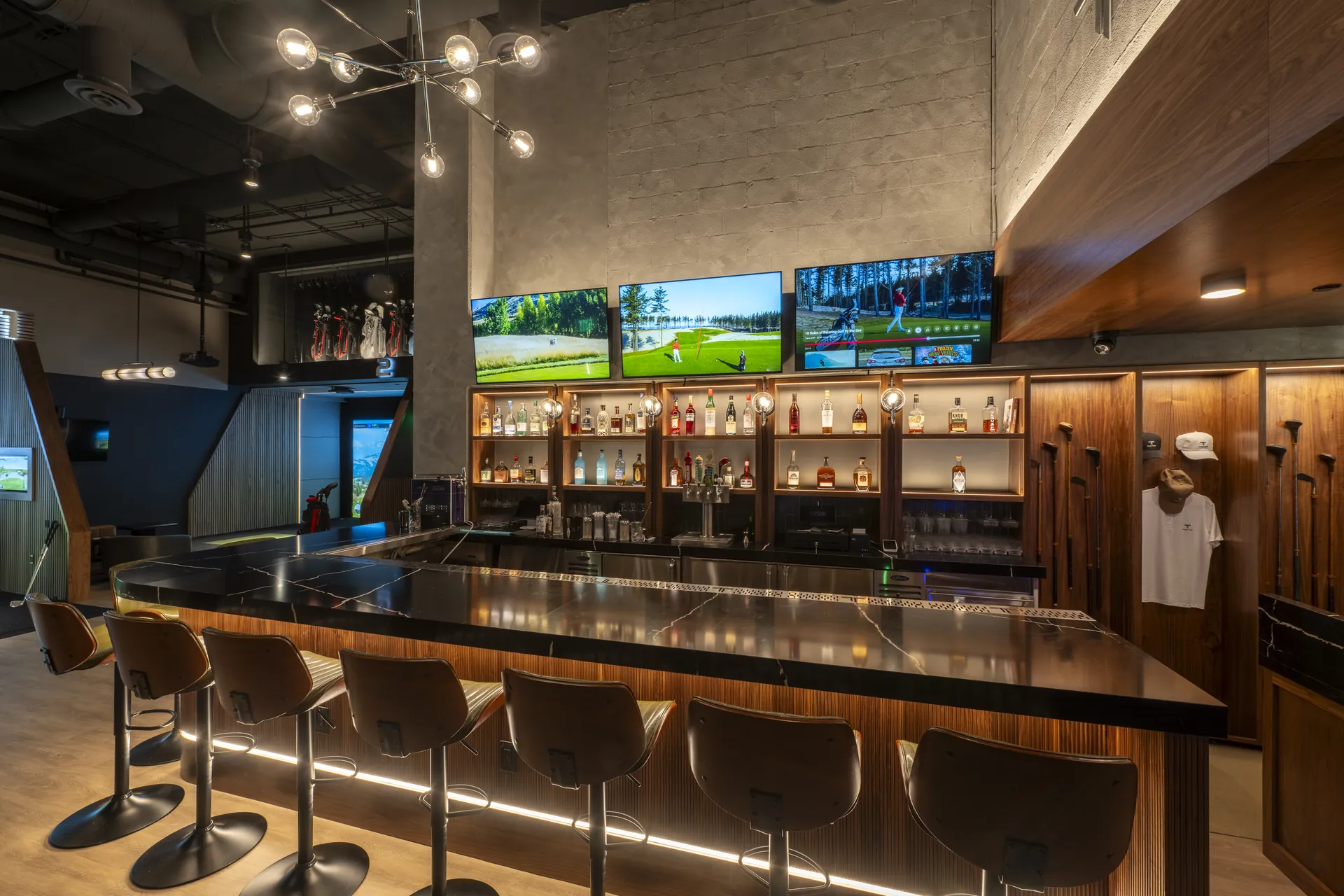 The Tips Golf lounge interior with simulator bays and full bar, Brickell Miami
